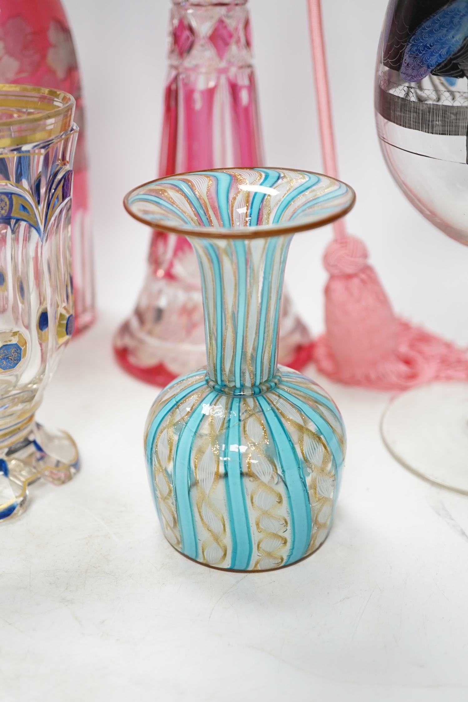Six pieces of Victorian and later glassware including Italian Vedar cocktail goblet, Bohemian cranberry glass atomiser and art glass vase, tallest 34cm. Condition - poor, fair and good, smallest piece broken and restored